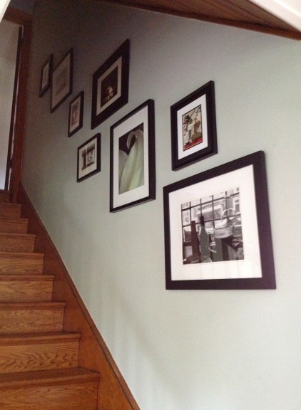 Staircase Wall with Black and White Photographs.