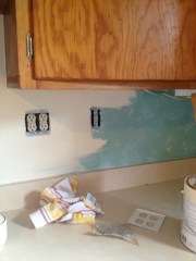 Getting rid of the faux-paint backsplash.