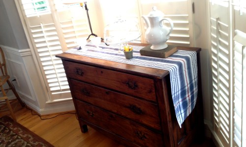 Antique dresser, in the bay window. Antique dresser, in the bay window.