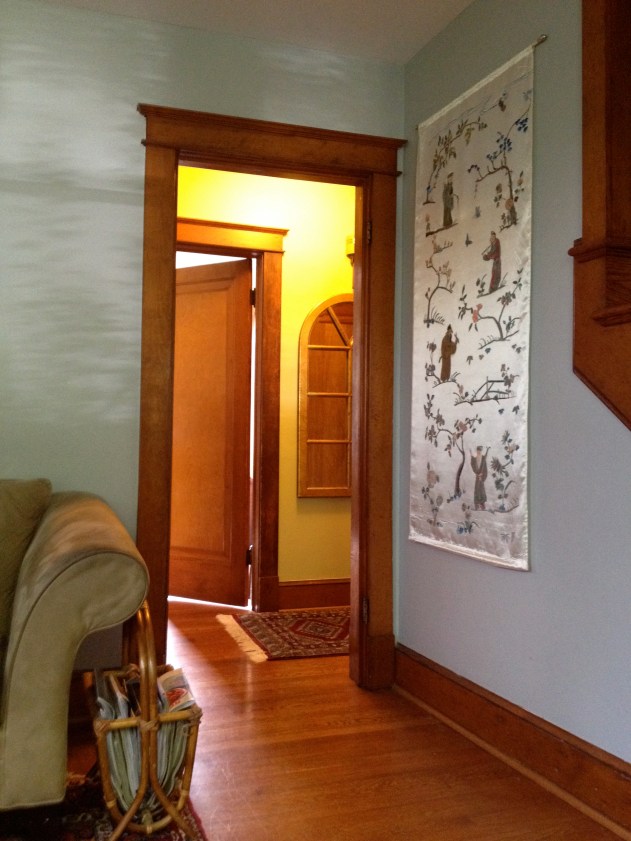 Peaking into the downstairs hallway.