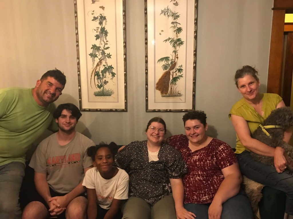 A family photo, all smiles.